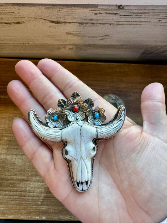 Big Antler longhorn with turquoise pendant with color flowers